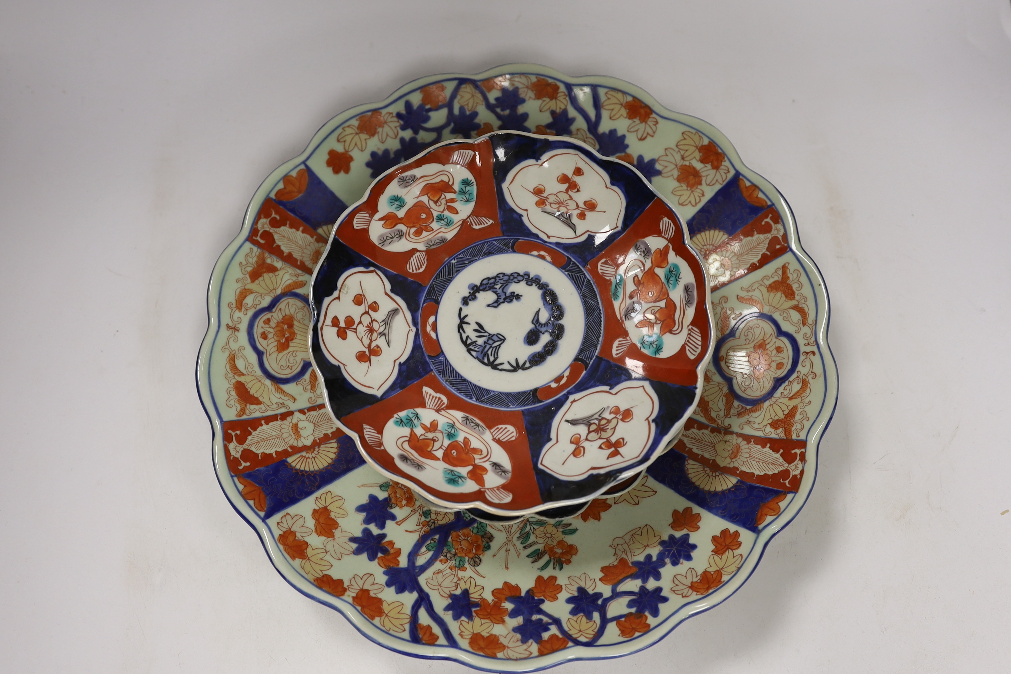 A group of Imari wares comprising bowl, charger and three dishes, largest 37cm in diameter